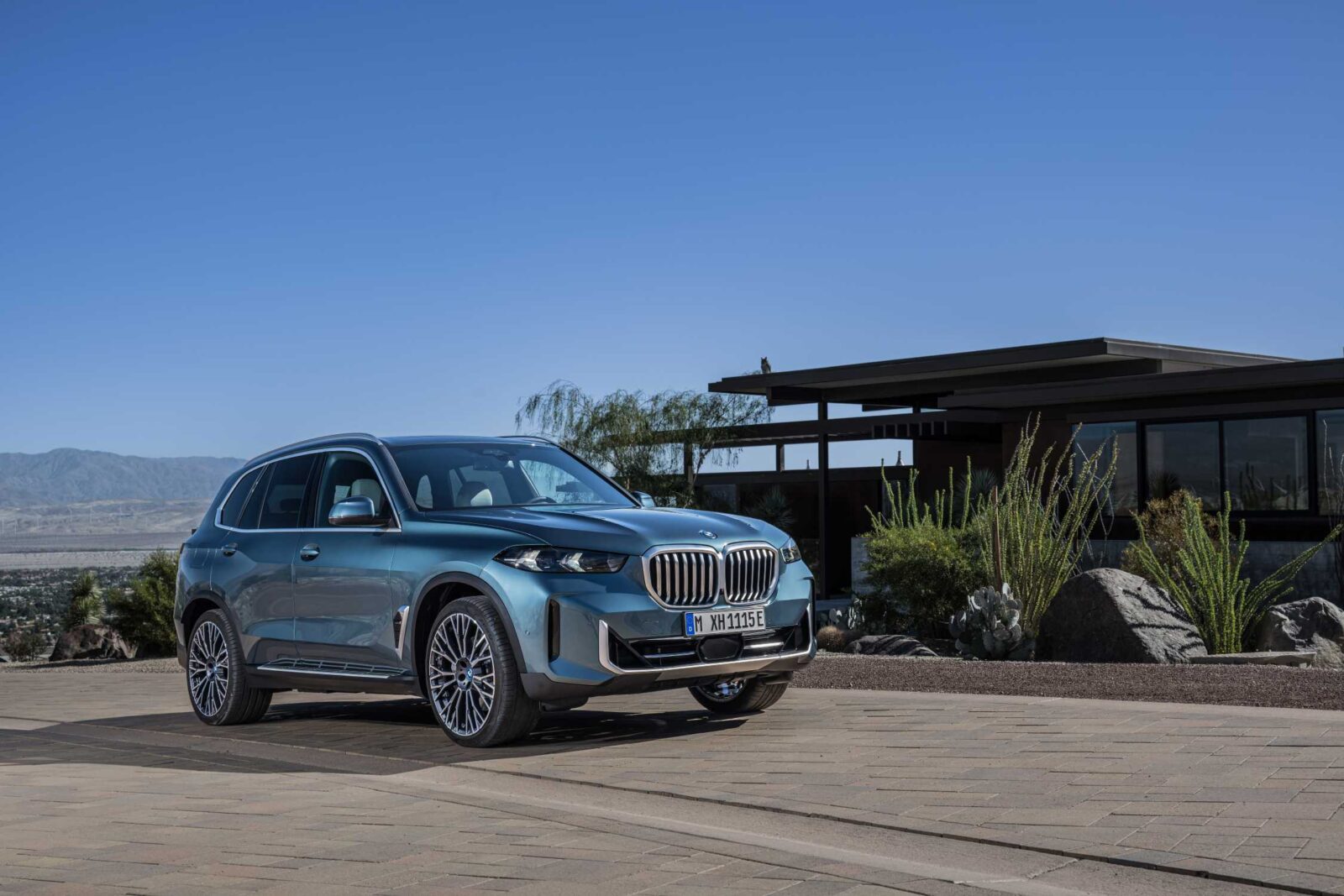 BMW X5 parked in a driveway